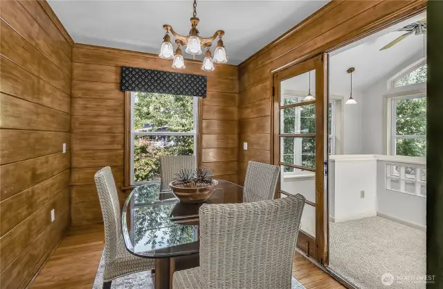 There is a sunny morning room off the dining room above the stair.