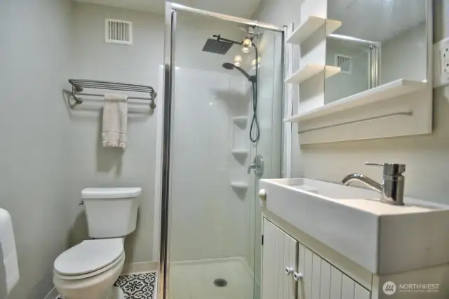 First bathroom with walk-in shower