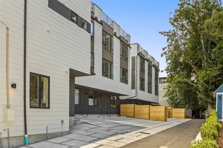 Even the rear elevations are carefully considered, with clean design lines and smart access to parking and storage.