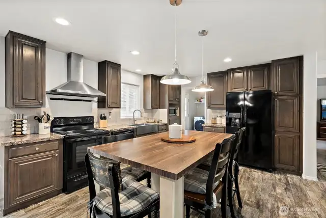 Stunning kitchen with breakfast bar island.