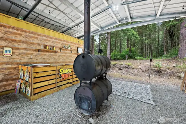 Wood burning stove to keep warm under cover during the colder months.