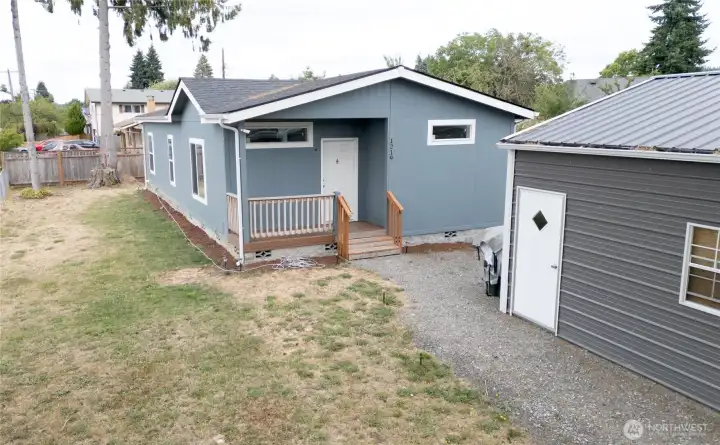 Front of house with partial view of Garage