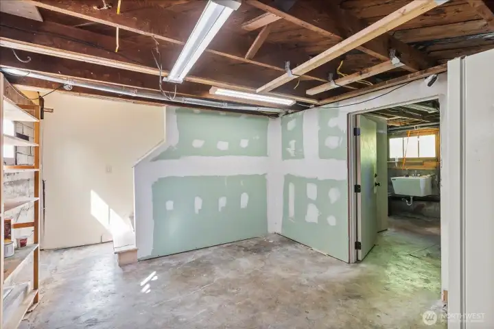 Partially unfinished basement with endless potential
