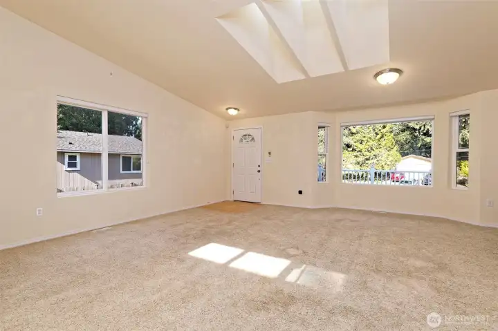 Entry into great room with wonderful skylights