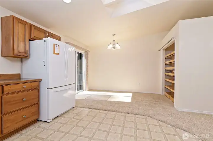 Closet converted to a pantry with pull out drawers.