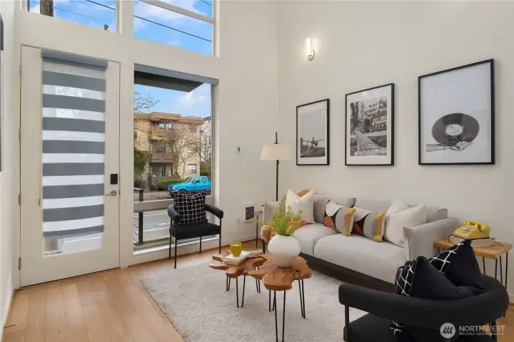 Near floor-to-ceiing windows bring in the natural light and create an architectural quality seldom seen in townhomes.