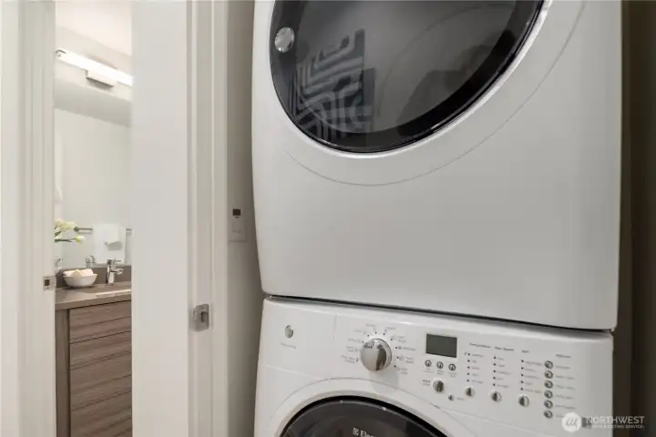 Full sized front loading washer and dryer are included.