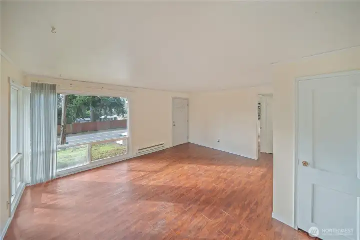 Bright living space featuring new paint and plenty of natural light.