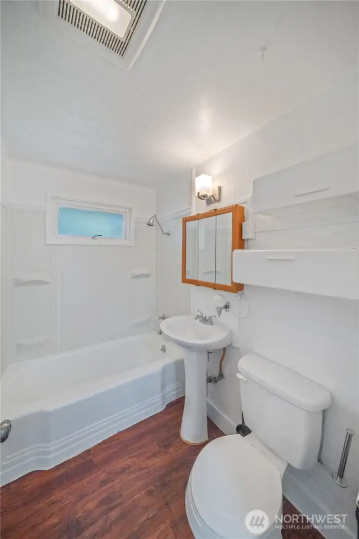 Clean and functional bathroom with a fresh, well-kept feel.
