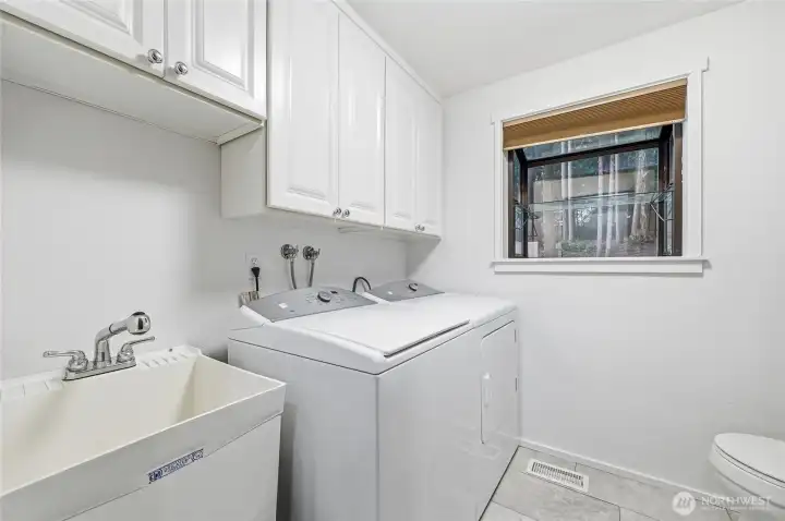 Utility Room with 1/2 bach