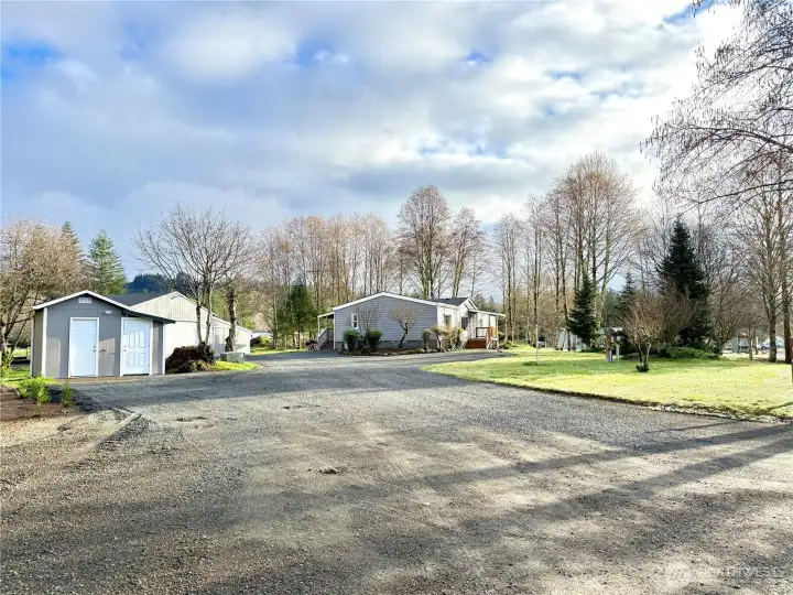 109 Obsidian Dr in Ariel Washington is an updated kitchen, flooring in this 3 bedrooms, 2 full bathrooms on 2 flat acres that is move-in ready. 3 outbuildings, fenced garden with garden boxes, plenty of parking outside and in the shop.