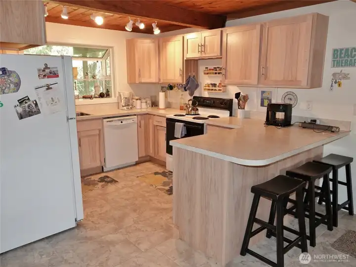 Kitchen w/ Eating Bar.