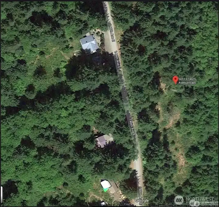 aerial view of street and lot