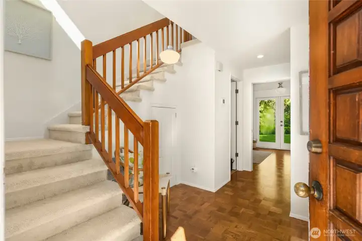 The main entry with stylish parquet floors leading to the main living areas.