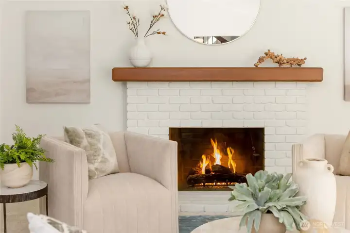 Wood-burning fireplace at living room.