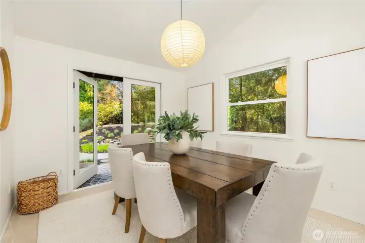 The formal dining room offers easy access to lovely gardens and patio.