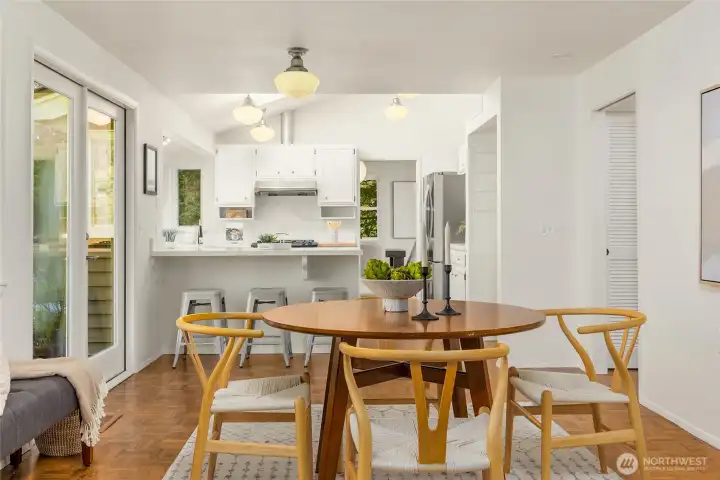Beautiful parquet flooring and charming schoolhouse lighting.