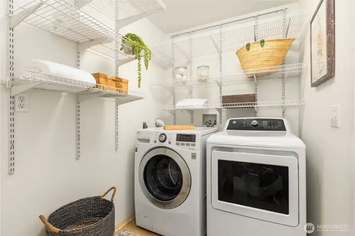 A well-planned laundry room just off the great room with access to the garage.