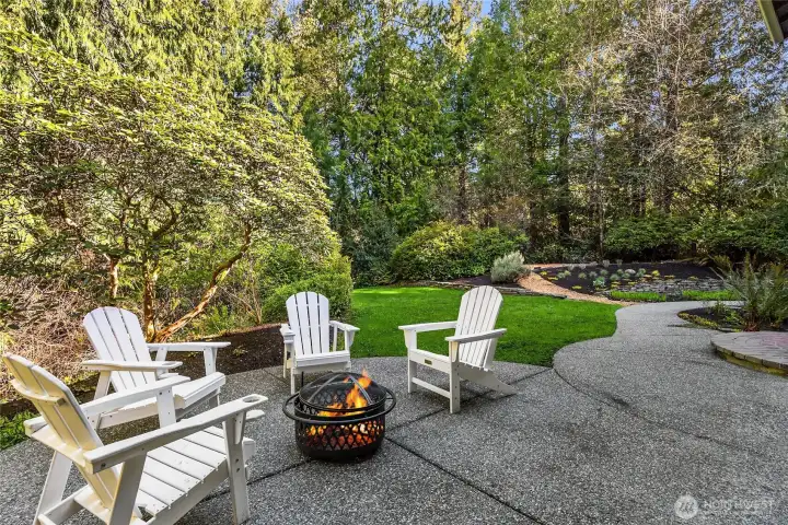 Kitchen flows to this beautifully landscaped backyard and large patio ideal for weekend BBQs and gatherings.