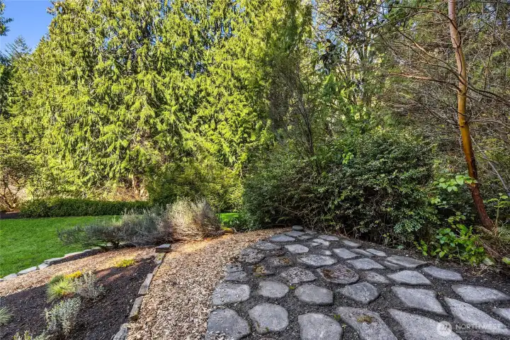 You will find interesting stone work throughout the yard.