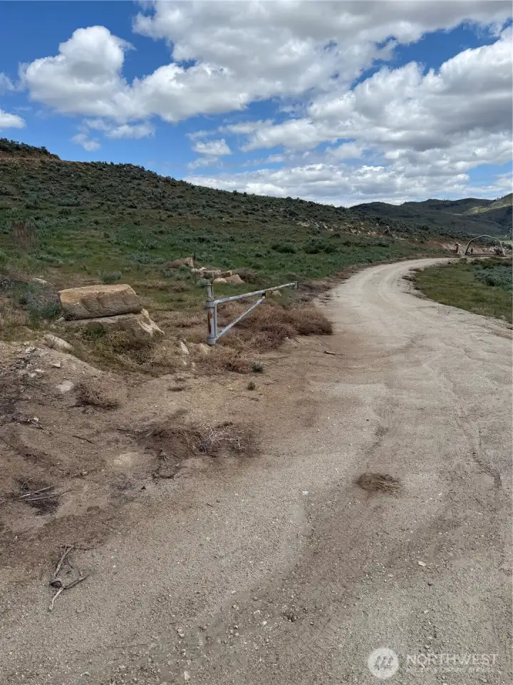 Once you have arrived at the top, there is a RE sign at the gated entrance onto the property.