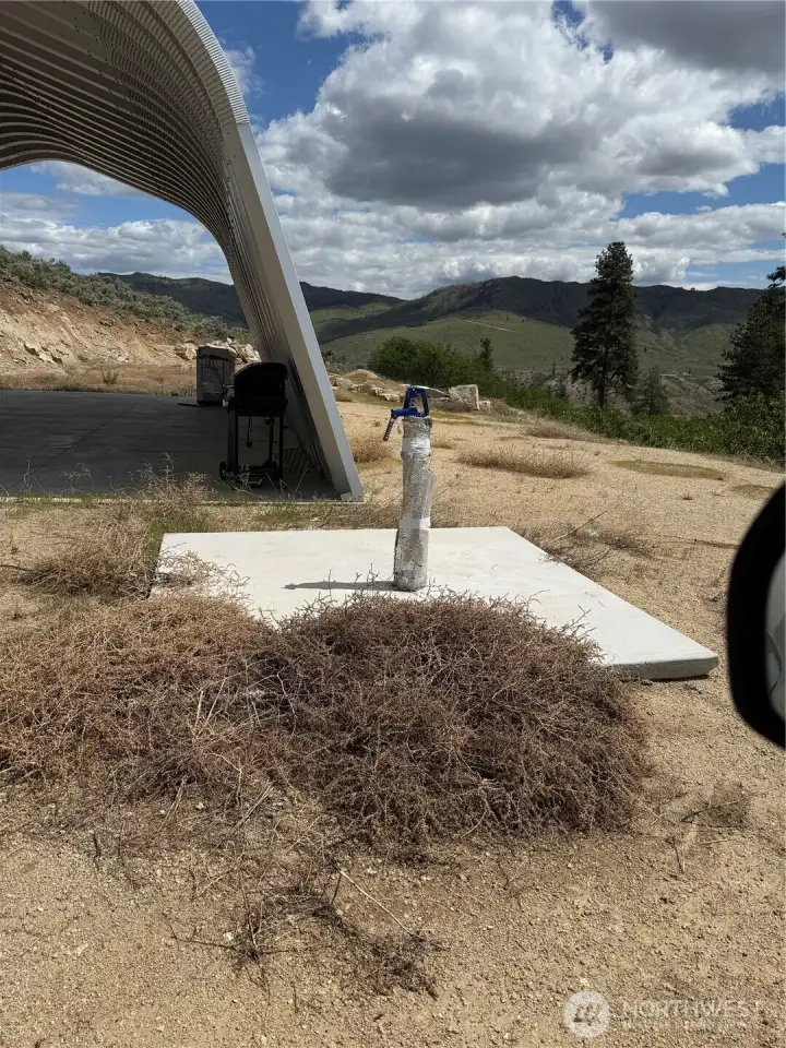 faucet near quonset hut. great access for fresh water at your finger tips.