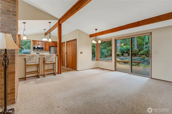 Upstairs living space off kitchen with slider access to back deck.
