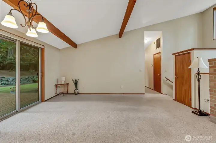 Open dining space/family room with storage closet to the right.