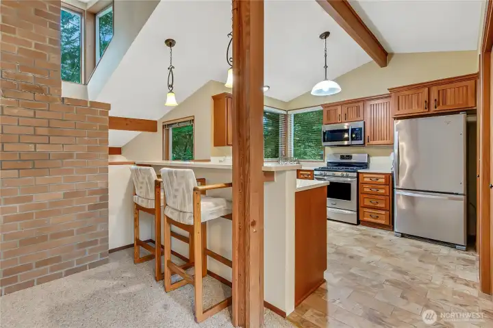 Kitchen with bar seating.