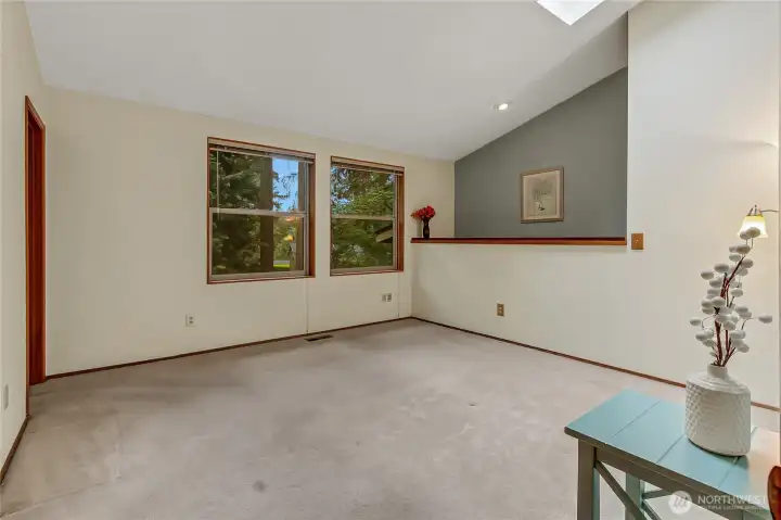 Primary bedroom off the front of home.  Large and spacious with storage/loft space.