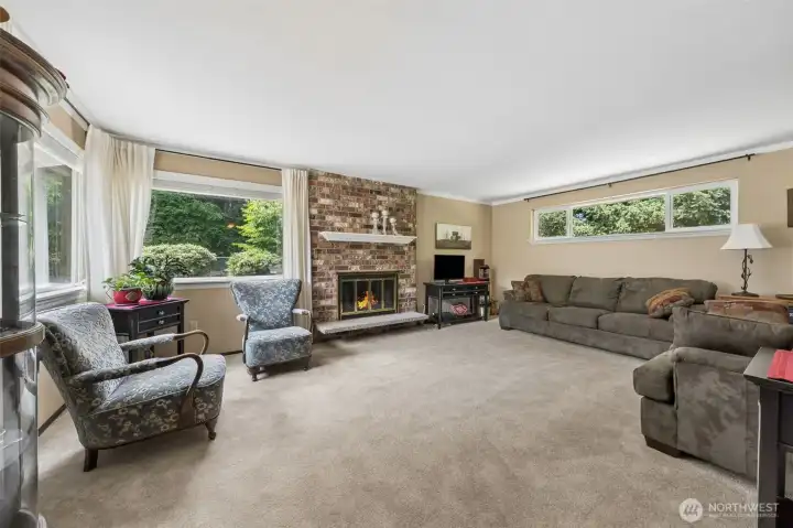 Inside you'll find a lovely Living Room with a fireplace to gather around in the cooler months.