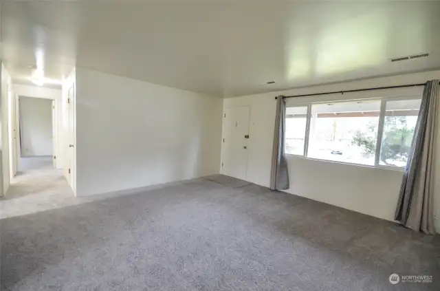 A view from living area down hall. Clean, bright and cheery home !