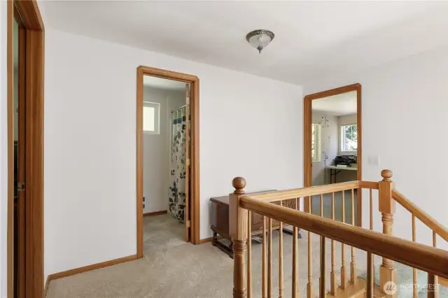 Full bath upstairs and another bedroom with exercise room on right