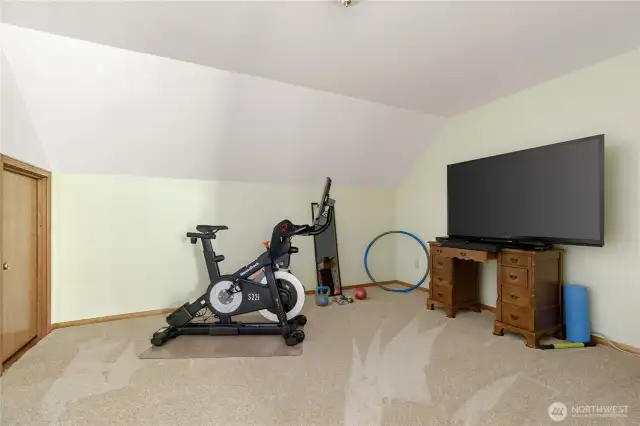 Flex space off bedroom with attic access to left