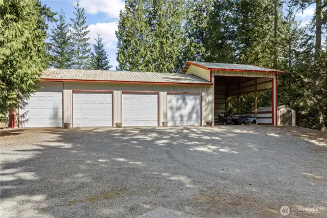 4-bay 1,620 square foot shop with over-sized RV/boat carport and additional storage shed