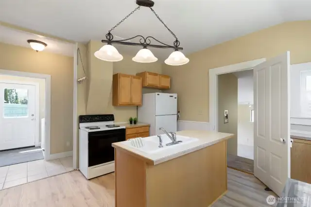 Kitchen looking towards laundry room with separate entrance.