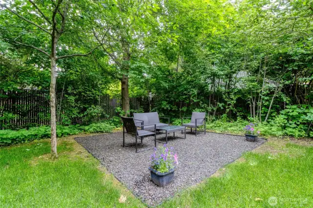 Outdoor seating area under the Hawthorne canopy.