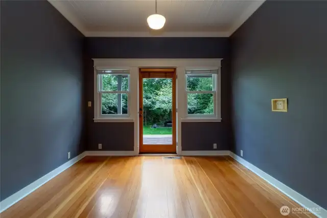 Sunroom with access to back deck.