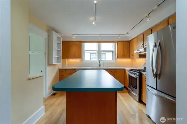 Island is not attached, easily moved to be utilized in another space.
