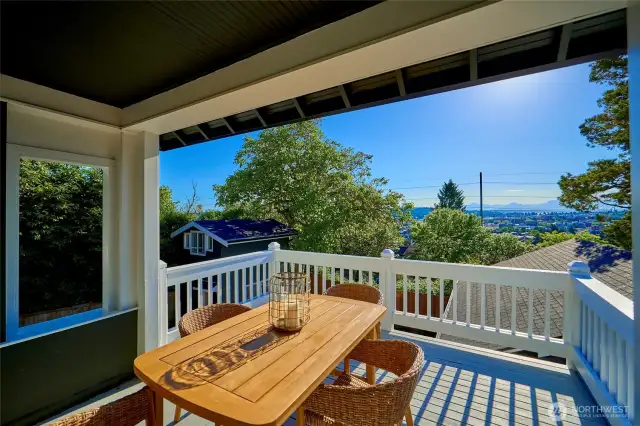 Spacious deck for al fresco dining with expansive views.