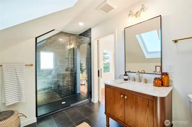 Tons of natural light flood primary en-suite.