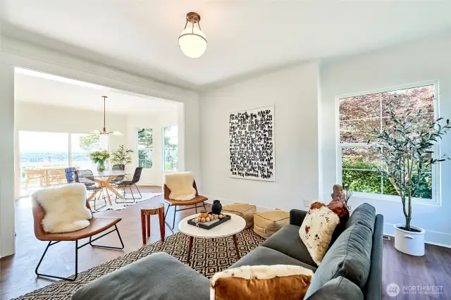 Living space opens to dining room and deck to all the views.