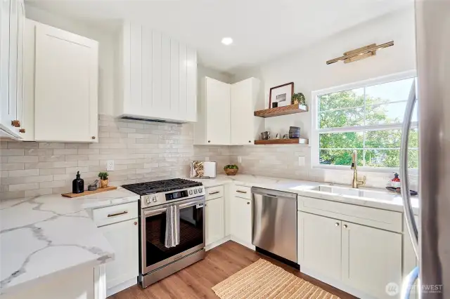 Stunning architectural finishes and custom hood design with window overlooking western views.