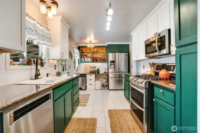 Fresh, modern appliances spark joy in the kitchen, creating a fun, functional space perfect for whipping up gourmet meals and hosting lively gatherings.