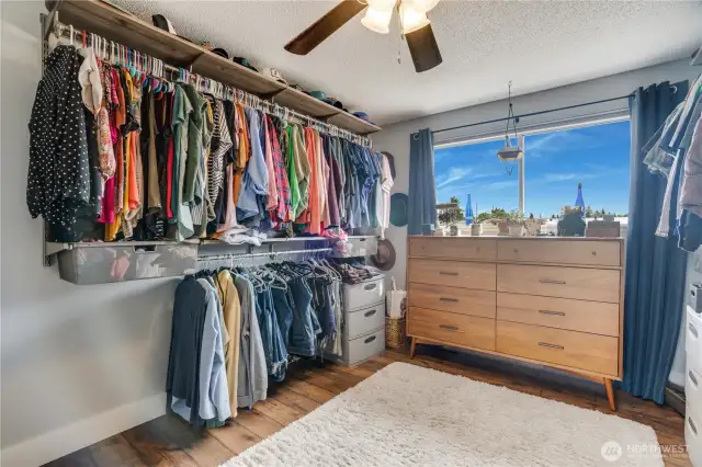 The third main-floor bedroom, currently a versatile flex space for the seller, adapts effortlessly to your needs.