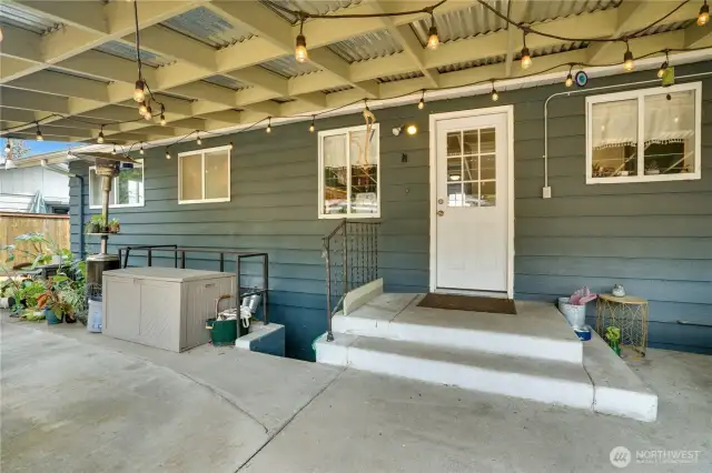 Enjoy seamless flow from the kitchen to the covered patio or downstairs basement, making entertaining and everyday living a breeze with effortless access.