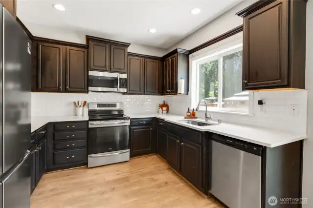 Large kitchen with plenty of storage.