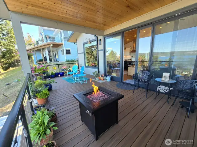 Oversized Sliding Doors lead you to Relaxing Back Deck