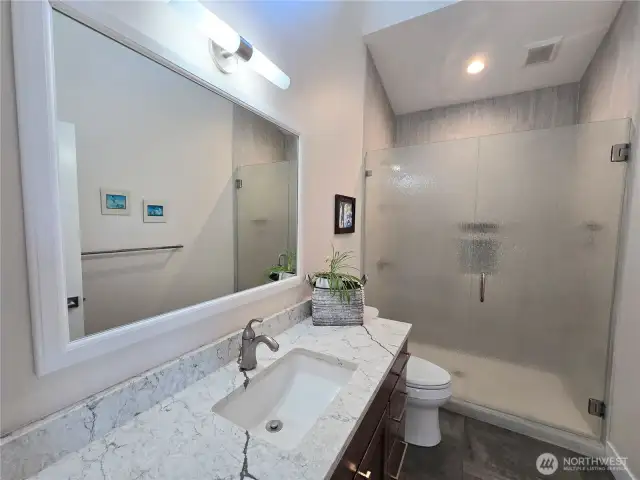Custom Guest Bathroom with Tile Shower