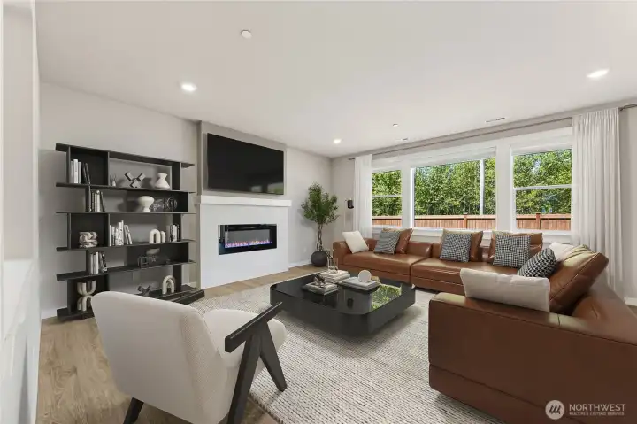 Great room, virtually staged showing similar plan.